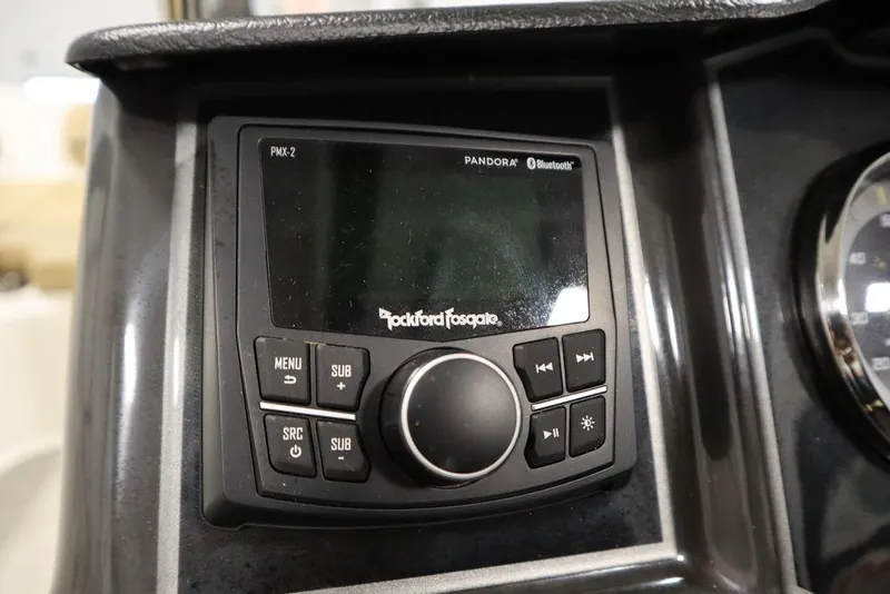 Slide: The Image of Rockford Fosgate audio system in 2024 Bayliner VR5 Bowrider boat dashboard. - 18