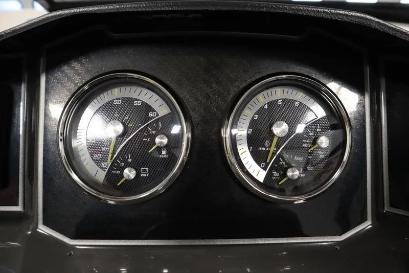 Slide: The Image of 2024 Bayliner VR5 Bowrider dashboard with dual gauges, featuring speedometer and tachometer. - 20