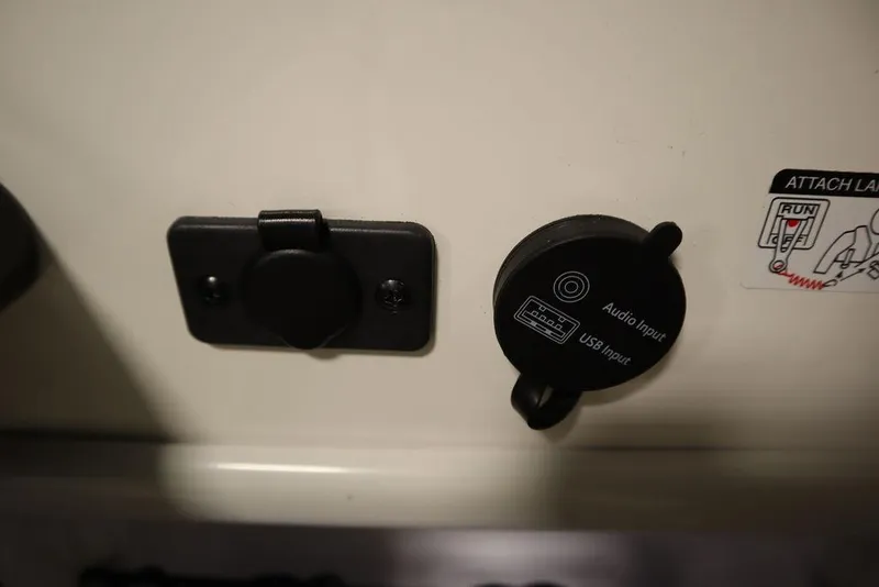 Slide: The Image of 2024 Bayliner VR5 Bowrider audio and USB input panel. - 21