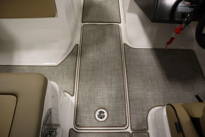 Slide: The Image of 2024 Bayliner VR5 Bowrider interior flooring and seating detail. - 29