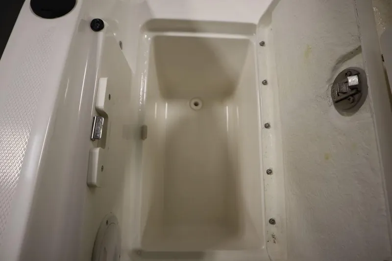 Slide: The Image of 2024 Bayliner VR5 Bowrider storage compartment, featuring a spacious and secure design. - 41