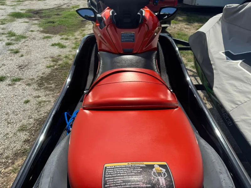Slide: The Image of Red seat of a 2015 Kawasaki 310lx jet ski on a trailer. - 7
