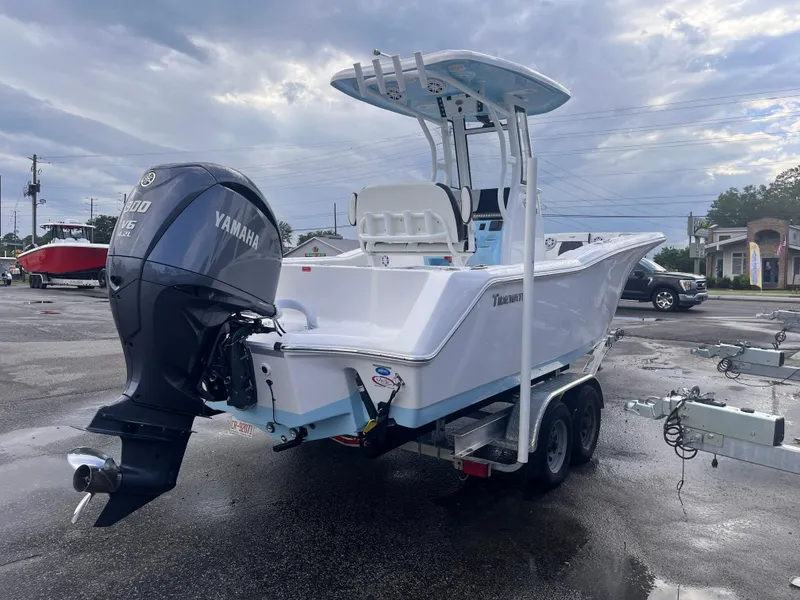 Slide: The Image of 2023 Tidewater 232 CC Adventure boat with Yamaha V6 engine on a trailer. - 4