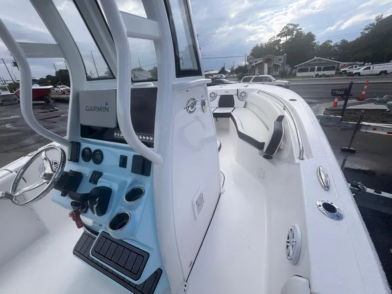 Slide: The Image of 2023 Tidewater 232 CC Adventure boat interior with Garmin navigation system. - 8