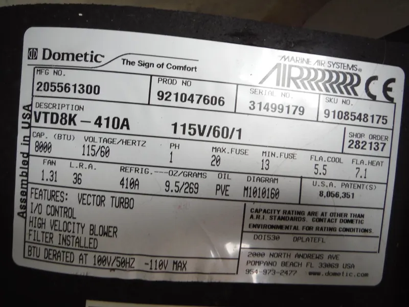 Slide: The Image of Label on Dometic marine air system, model VTD8K-410A, 115V, 8000 BTU, features vector turbo. - 28