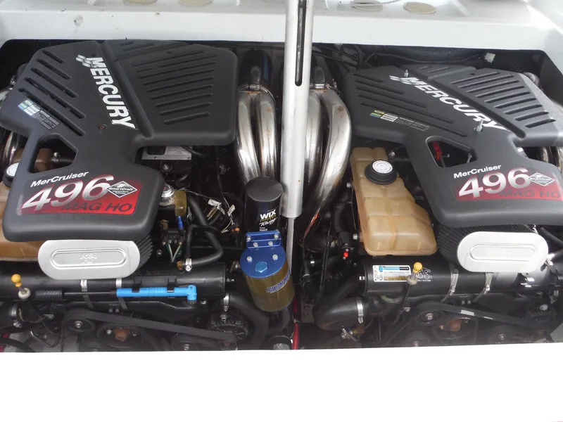 Slide: The Image of Twin MerCruiser 496 MAG HO engines in a 2003 Baja 36 Outlaw boat. - 34