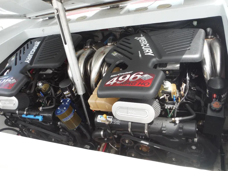 Slide: The Image of 2003 Baja 36 Outlaw engine compartment with dual Mercury MerCruiser 496 MAG HO engines. - 37