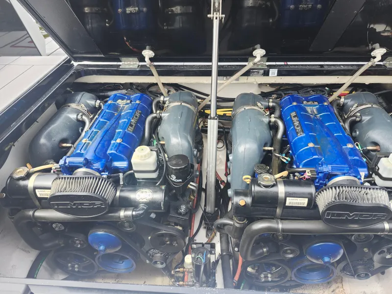 Slide: The Image of Twin Ilmor engines in a 2020 Aviara AV32 I/O boat, showcasing powerful marine engineering. - 26