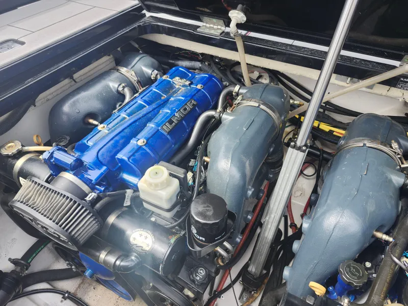 Slide: The Image of 2020 Aviara AV32 I/O engine compartment with Ilmor engine components. - 27