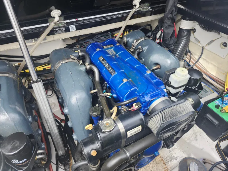 Slide: The Image of Engine compartment of a 2020 Aviara AV32 I/O boat, featuring an Ilmor engine. - 28