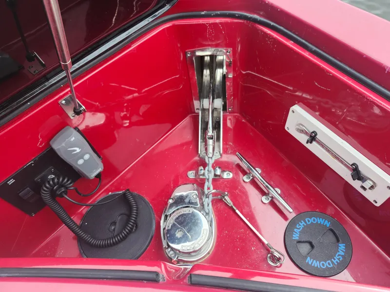 Slide: The Image of Red Aviara AV32 I/O 2020 boat interior with anchor chain and washdown system. - 30