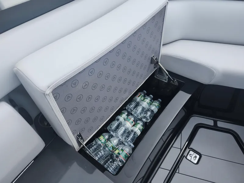Slide: The Image of Storage compartment with water bottles in 2020 Aviara AV32 I/O boat. - 33
