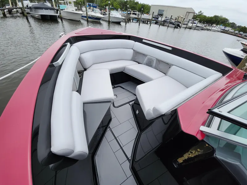 Slide: The Image of Luxurious seating area on 2020 Aviara AV32 I/O boat docked at marina. - 6