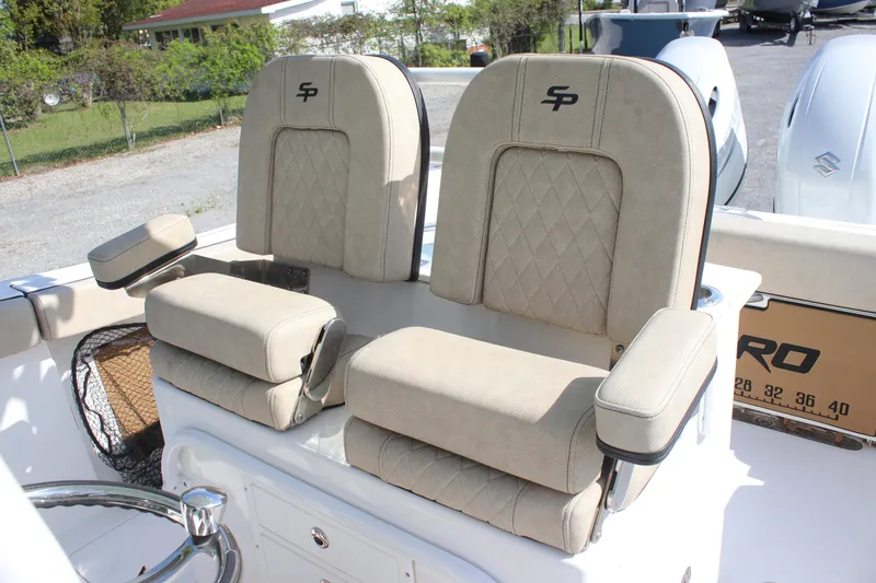Slide: The Image of 2023 Sea Pro 259 Deep V CC boat seats with armrests and diamond stitching. - 5