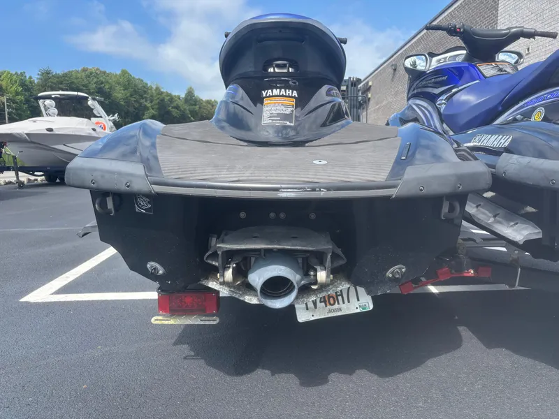 Slide: The Image of 2006 Yamaha WaveRunner FX HO jet ski on trailer, rear view in parking lot. - 6