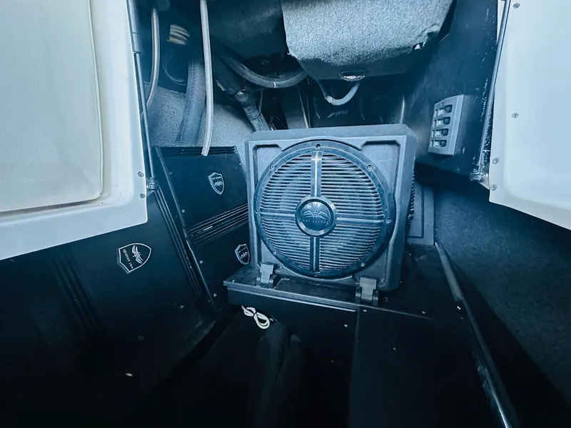 Slide: The Image of 2020 Tigé 25ZX boat interior with audio system and wiring. - 20