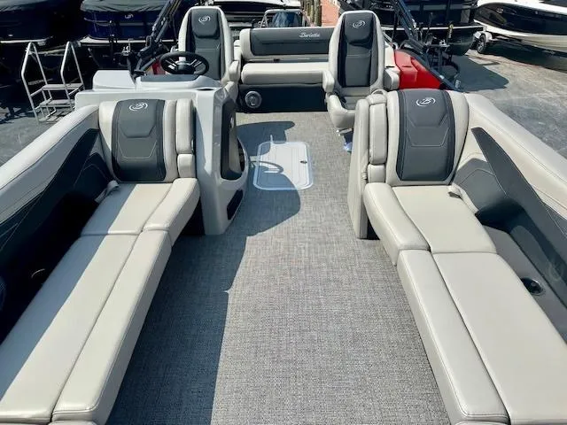 Slide: The Image of 2026 Barletta C24UC pontoon boat interior with spacious seating and modern design. - 3