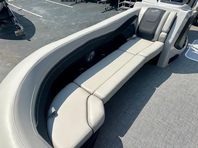 Slide: The Image of 2026 Barletta C24UC boat interior with sleek, comfortable seating and modern design. - 4