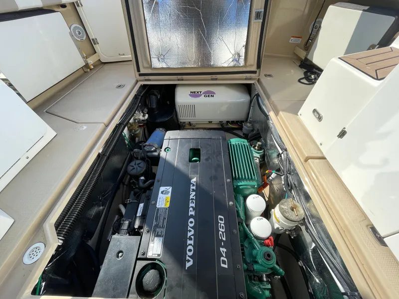 Slide: The Image of Engine compartment of a 2017 Cutwater C-28 boat featuring a Volvo Penta D4-260 engine. - 8