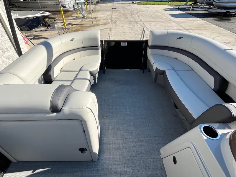 Slide: The Image of Luxurious seating on 2025 Starcraft EXS-3 boat, featuring spacious, comfortable interior design. - 16
