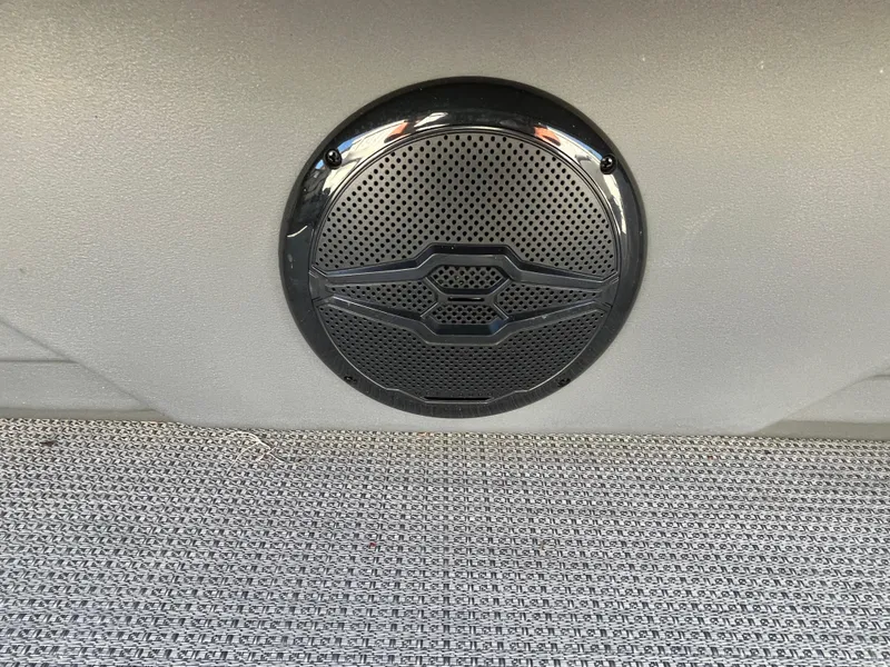 Slide: The Image of Speaker grille on Starcraft EXS-3 boat, 2025 model, with textured flooring. - 19