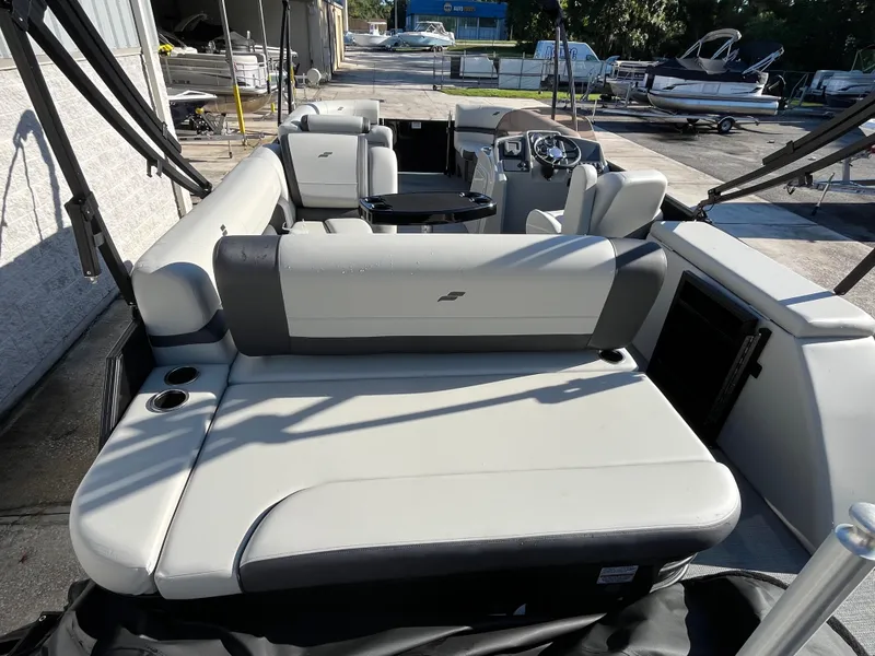 Slide: The Image of 2025 Starcraft EXS-3 boat interior with spacious seating and modern design. - 9