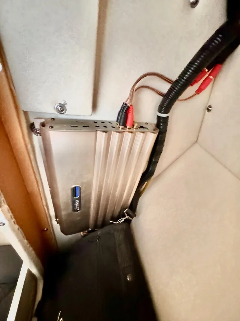 Slide: The Image of Audio amplifier installed in a 2001 Sea Ray 270 Sundancer boat interior. - 16