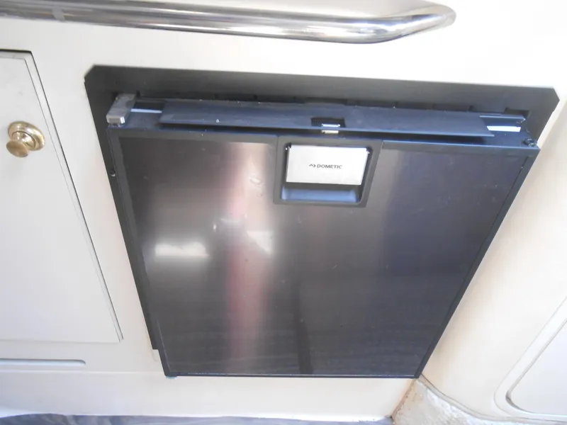 Slide: The Image of Dometic refrigerator in 2001 Sea Ray 270 Sundancer boat interior. - 31