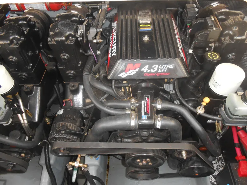Slide: The Image of Engine compartment of a 2001 Sea Ray 270 Sundancer with 4.3L EFI Mercury engine. - 34
