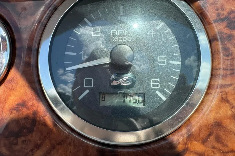 Slide: The Image of Close-up of 2002 Sea Ray 240 Sundeck tachometer showing 173.0 hours. - 9