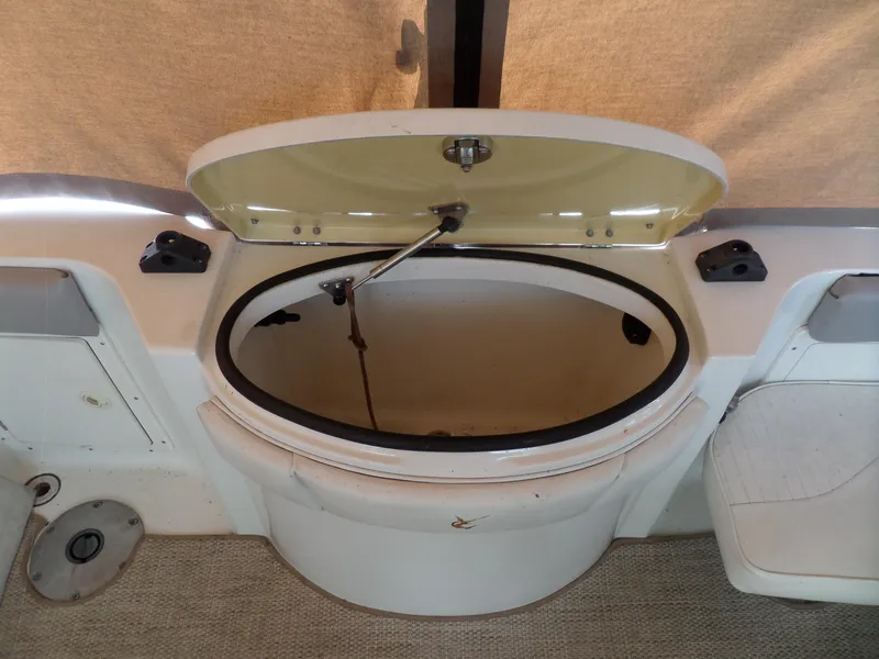 Slide: The Image of Open storage compartment on a 2005 Seaswirl Striper boat. - 15