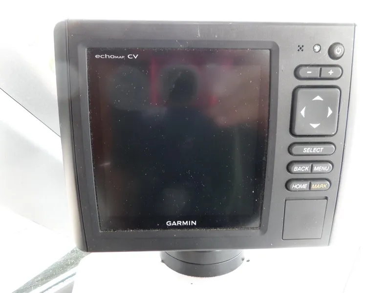 Slide: The Image of Garmin echomap CV on 2005 Seaswirl Striper boat dashboard, featuring navigation controls. - 20