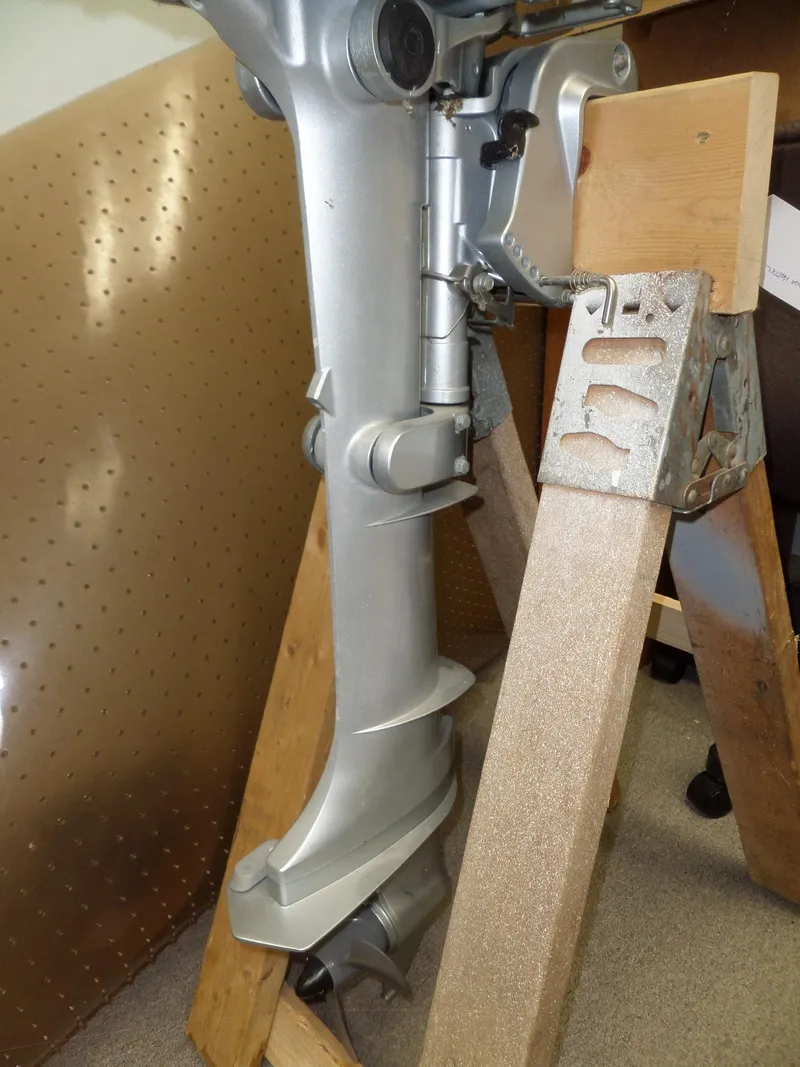 Slide: The Image of 2005 Seaswirl Striper outboard motor on wooden stand, detailed view. - 32
