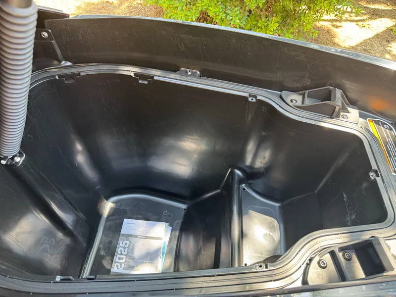 Slide: The Image of Open storage compartment of 2025 Sea-Doo GTX 230 watercraft. - 8