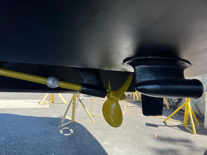 Slide: The Image of Close-up of 2000 Sea Ray 340 Sundancer propeller and hull on stands. - 40