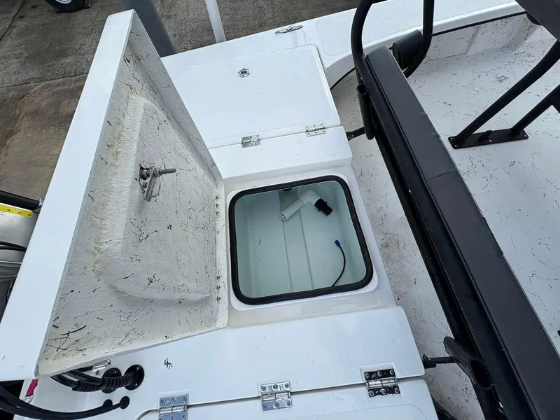 Slide: The Image of Open storage compartment on 2026 Freedom Boats USA 23' Warrior. - 4