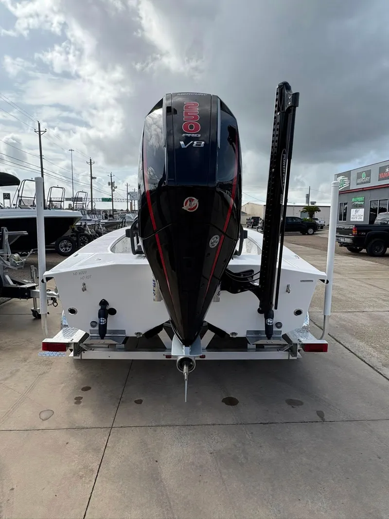 Slide: The Image of 2026 Freedom Boats USA 23' Warrior with powerful V8 engine on display. - 9