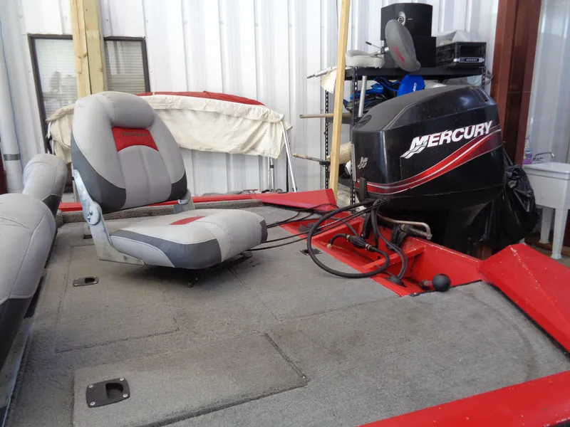 Slide: The Image of 2008 Bass Tracker PT175 boat with Mercury engine and gray seating. - 4