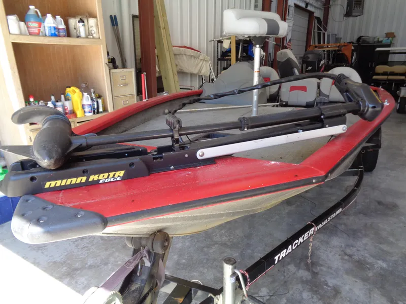 Slide: The Image of 2008 Bass Tracker PT175 boat with Minn Kota Edge trolling motor in a garage. - 7