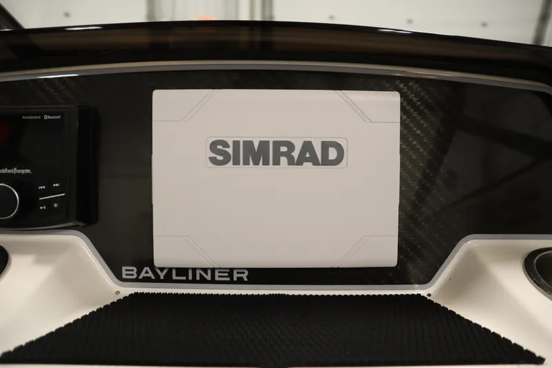 Slide: The Image of Dashboard of 2025 Bayliner D22I with Simrad display and audio controls. - 14