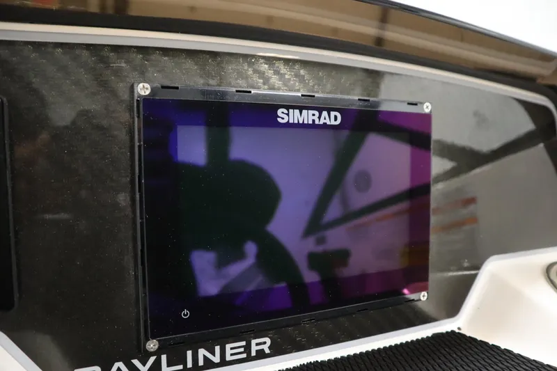 Slide: The Image of Simrad display on 2025 Bayliner D22I dashboard, featuring modern navigation technology. - 15