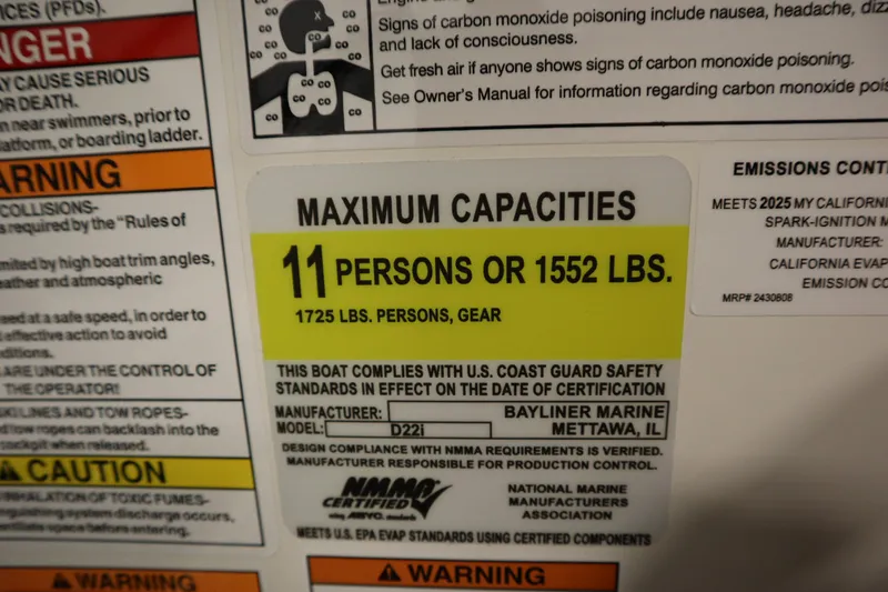 Slide: The Image of Bayliner D22I 2025 boat capacity label: 11 persons or 1552 lbs, safety warnings included. - 19