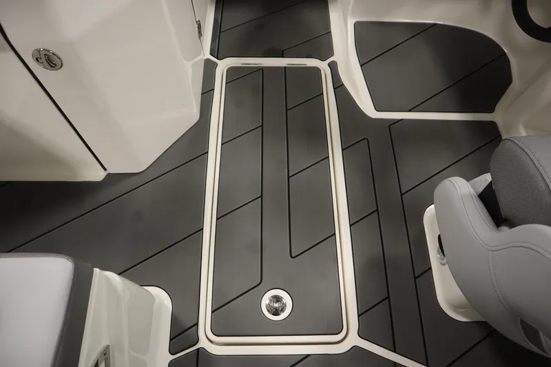 Slide: The Image of Bayliner D22I 2025 boat interior with sleek, modern flooring and seating. - 24