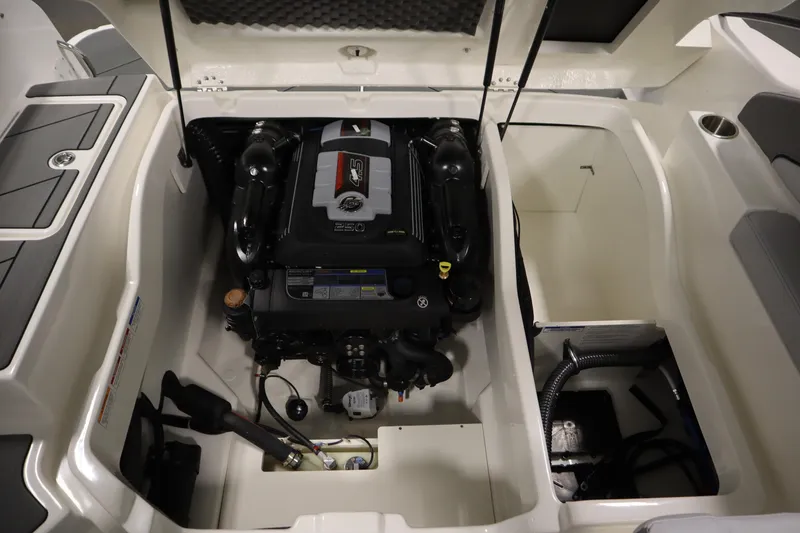 Slide: The Image of 2025 Bayliner D22I boat engine compartment, showcasing a powerful inboard motor. - 33