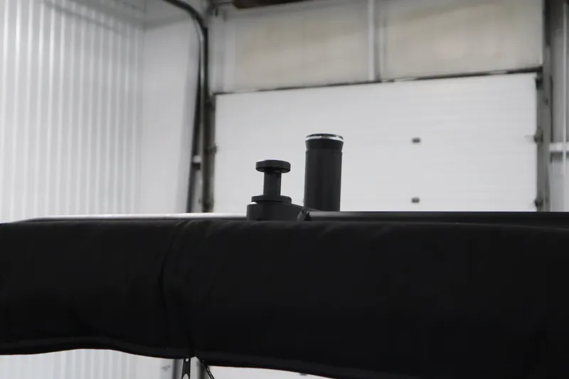 Slide: The Image of 2025 Bayliner D22I boat detail in a garage setting. - 42