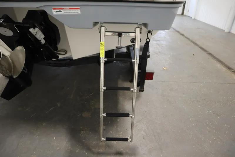 Slide: The Image of 2025 Bayliner D22I boat with extended metal ladder and visible propeller. - 45