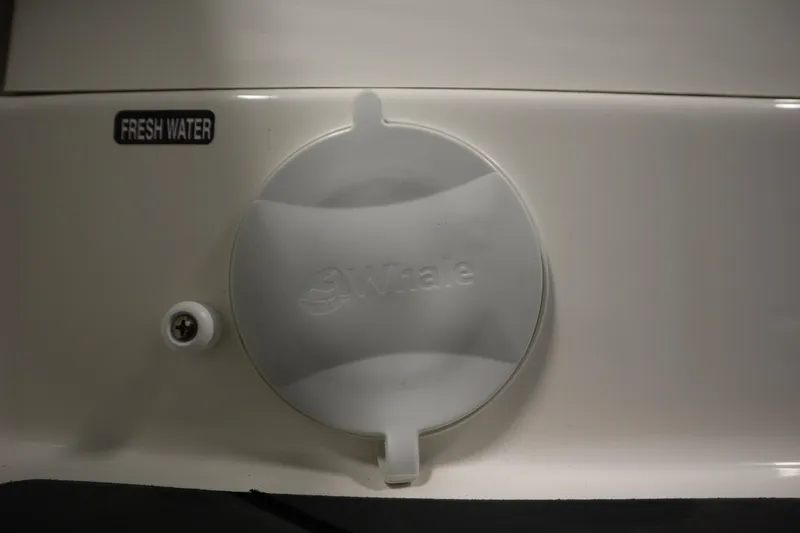 Slide: The Image of Fresh water access panel on 2025 Bayliner D22I boat. - 46