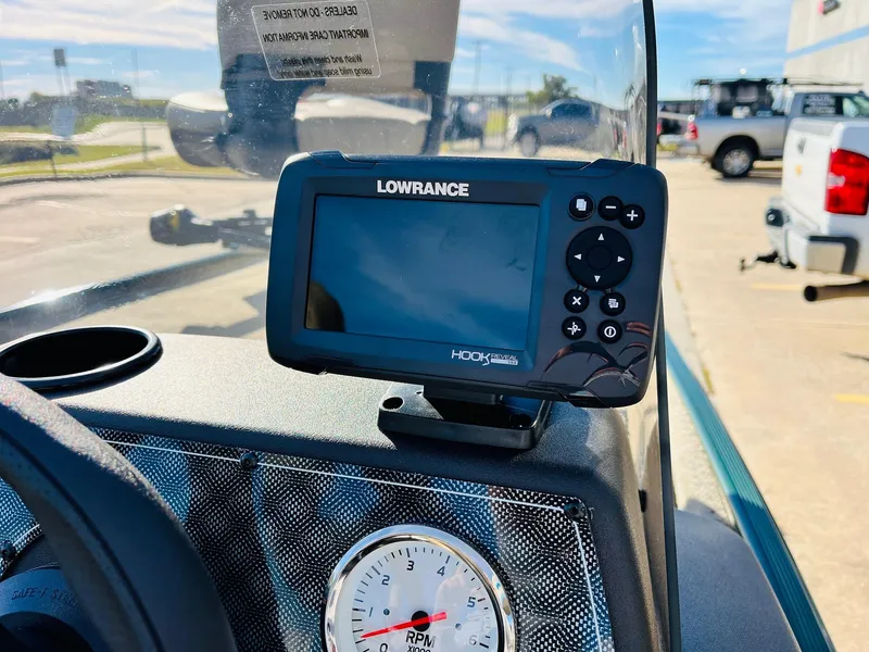 Slide: The Image of Lowrance Hook Reveal fish finder on 2026 Tracker Bass Tracker Classic Limited dashboard. - 28