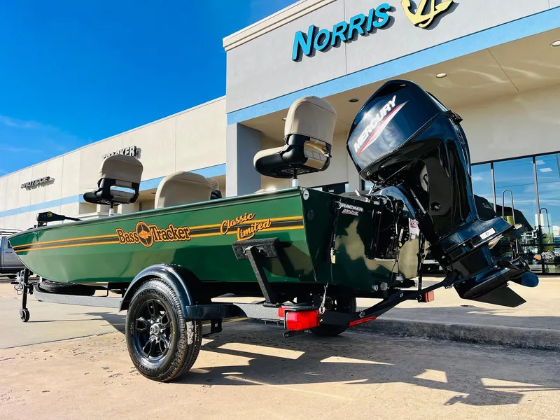Slide: The Image of 2026 Tracker Bass Tracker Classic Limited boat outside Norris dealership. - 6