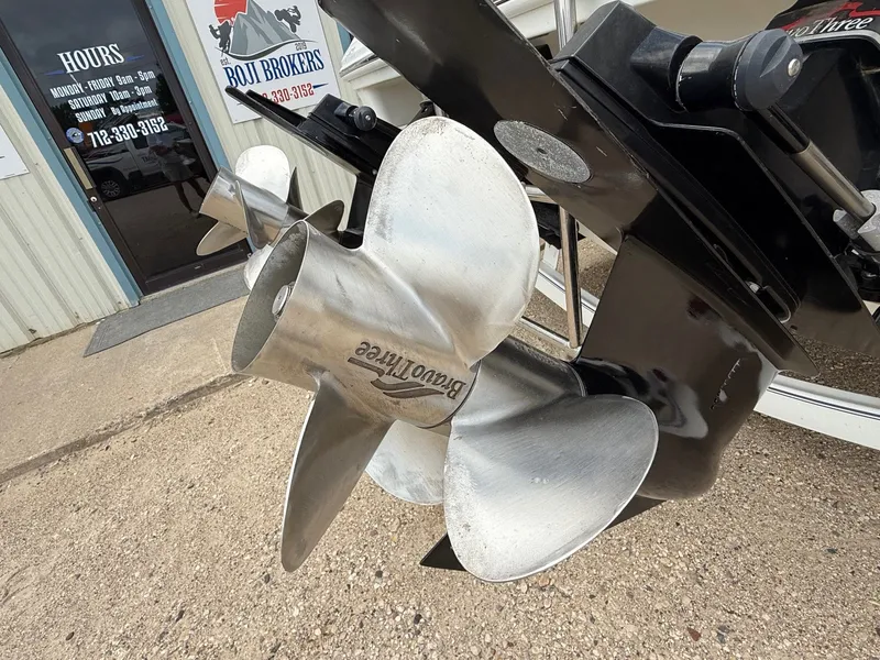 Slide: The Image of 1997 Formula 280SS boat propeller outside Boji Brokers office. - 12